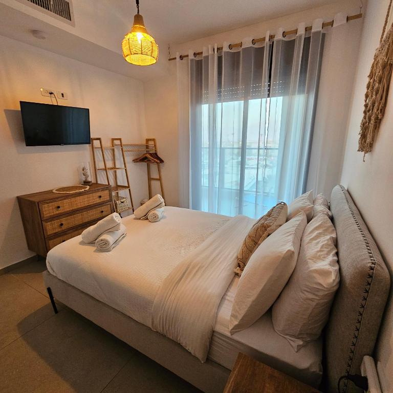 כרמונ'ס בוטיק - Carmona's Boutique - B&B Eilat