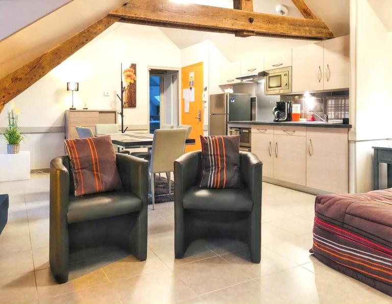 Appartement charmant à La Ferrière-aux-Étangs avec jacuzzi - 42 m² - Chambres d'hôtes La Ferrière-aux-Étangs
