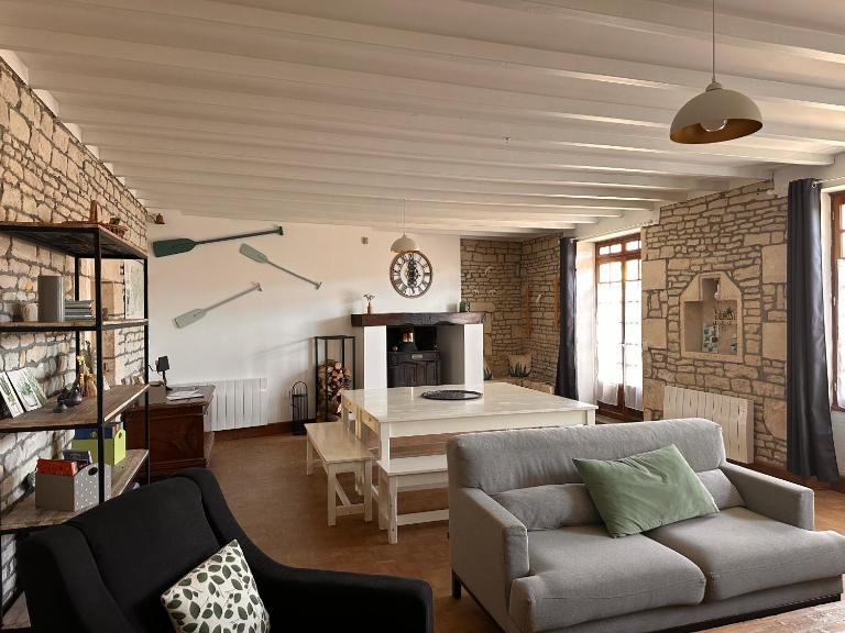 Une maraîchine en bord de conche avec barque sans linge de maison - B&B Arçais