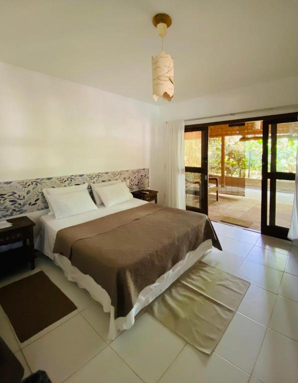 Flat Ewa Condomínio beira-mar Varanda Piscina - Chambres d'hôtes Maraú