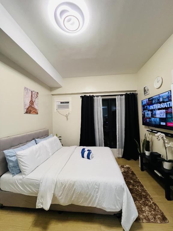 VINIA INFINITY STUDIO 4 near MALLS and MRT STATION - B&B Manila