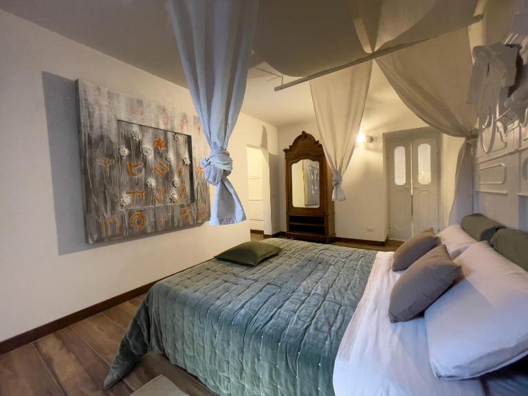 Museo Grillo Camere d'Arte, dormire nel Museo - B&B Arena Po
