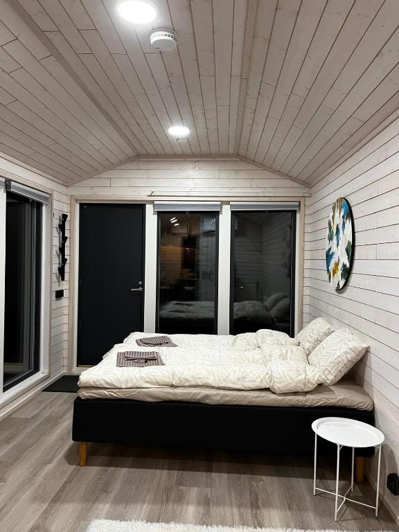 Willa Rauha 1A, minikoti katetulla terassilla, ei saunaa - Chambres d'hôtes Lumijoki