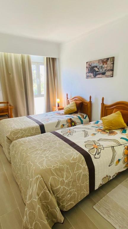 Apartamento relaxante com terraço e próximo da praia, no 2º andar - Chambres d'hôtes Quarteira