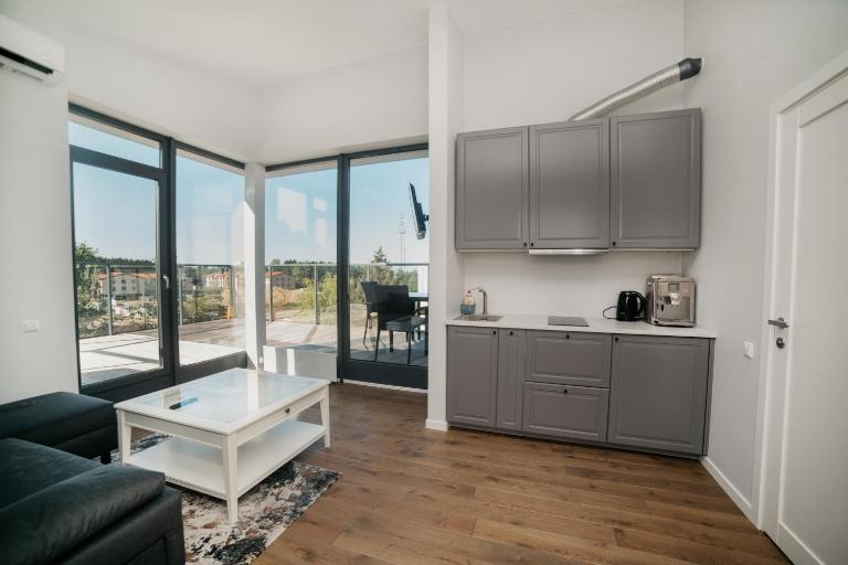 Monikos apartamentai Šventosios vartai 14K - B&B Šventoji