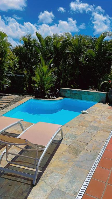 Bas de villa cosy avec piscine privative - B&B Le François
