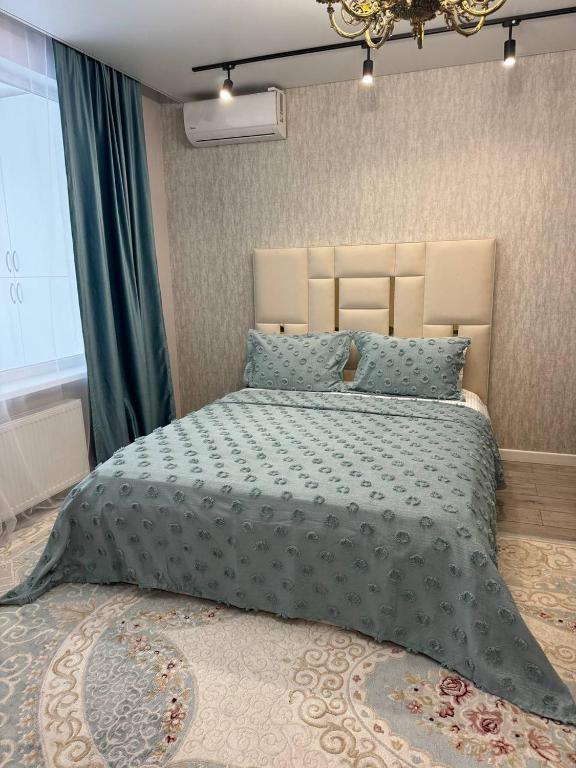 Очаровательная квартира в центре - Chambres d'hôtes Astana