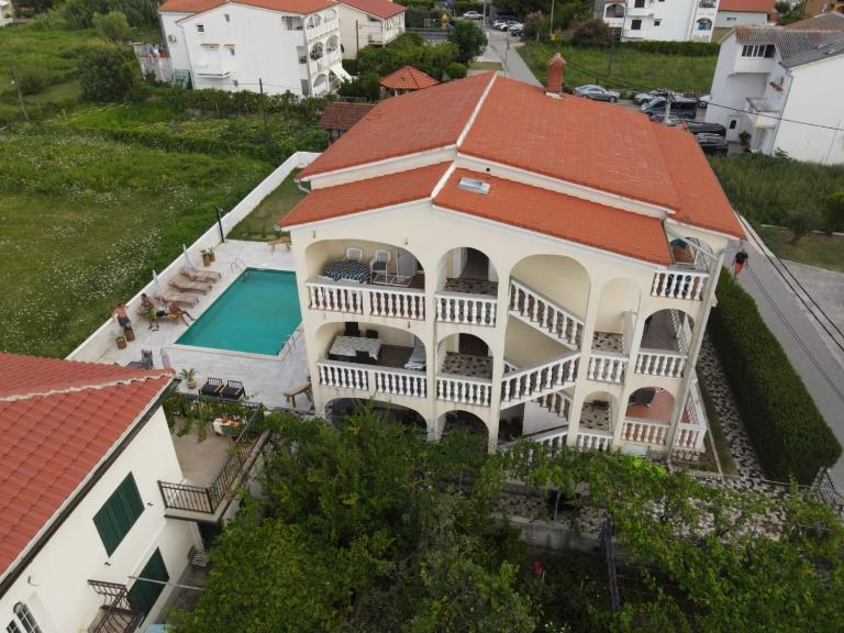Apartmani Ćućić - Ferienwohnung Lopar