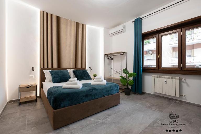 GFC Eternal Rome Apartment - 5min to Tiburtina Station MetroB, 2 Bathrooms, Terrace, A-C - Bed and Breakfast Rome
