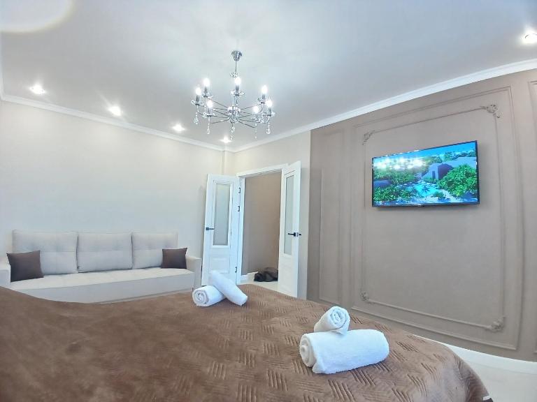 Комфортная квартира рядом с монументом Байтерек - Ferienwohnung Astana