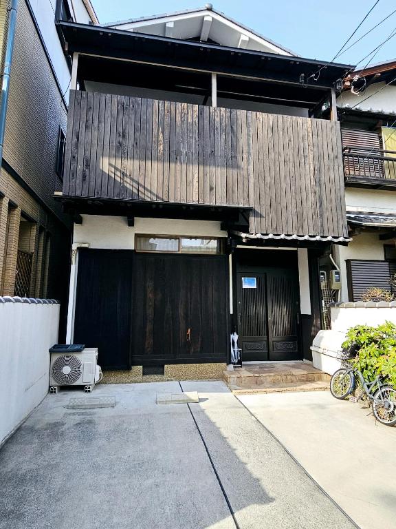 AnHome橘空港直通難波近 - Bed and Breakfast Osaka