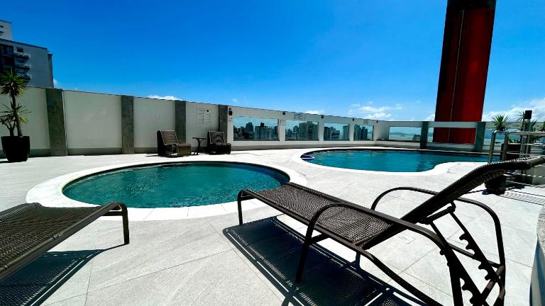 Apto vista magnífica condomínio familiar Floripa - Ferienwohnung Florianópolis