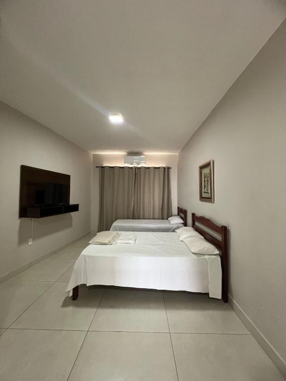 Apartamento 102 - Suíte com ar condicionado - Bed and Breakfast Patos de Minas
