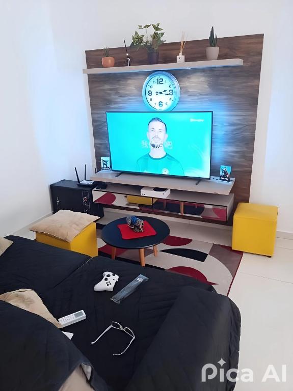Apartamento centralizado à poucas quadras do mar. - B&B Tramandaí