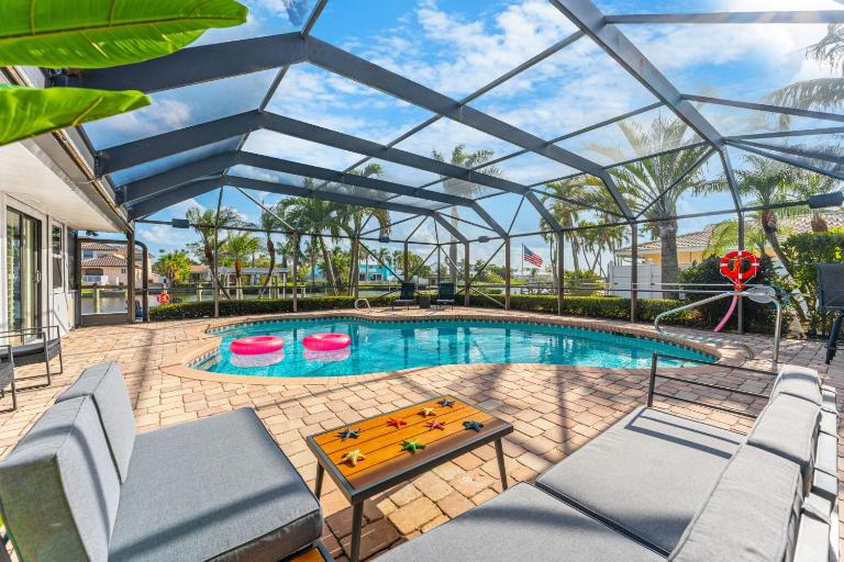 Casa De Olas - Waterfront Luxe Home - Heated Pool - Game Room - Boat Lift - Minutes to Beach - B&B Cocoa Beach