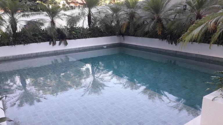 lindo apartamento martim de sá 2 dormitórios wi fi piscina pé na areia 32 b - B&B Caraguatatuba