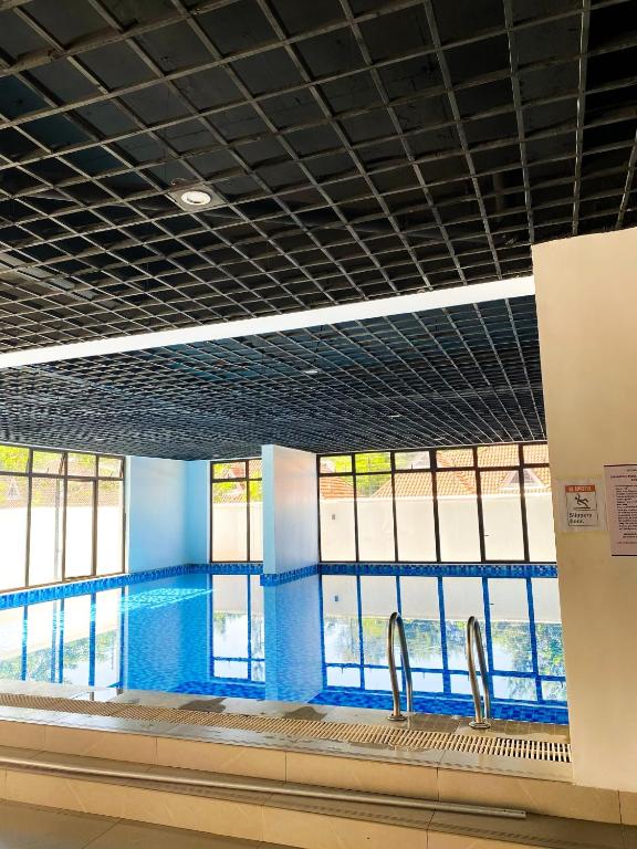Stylish Kileleshwa 1BR - Heated Pool Gym - Chambres d'hôtes Nairobi