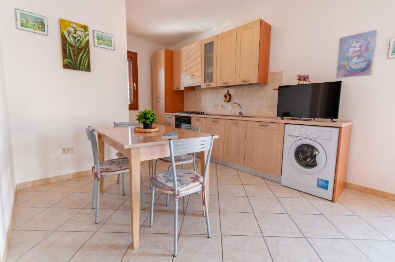 Appartamento Pina Caletta sul mare con parcheggio privato - B&B La Caletta