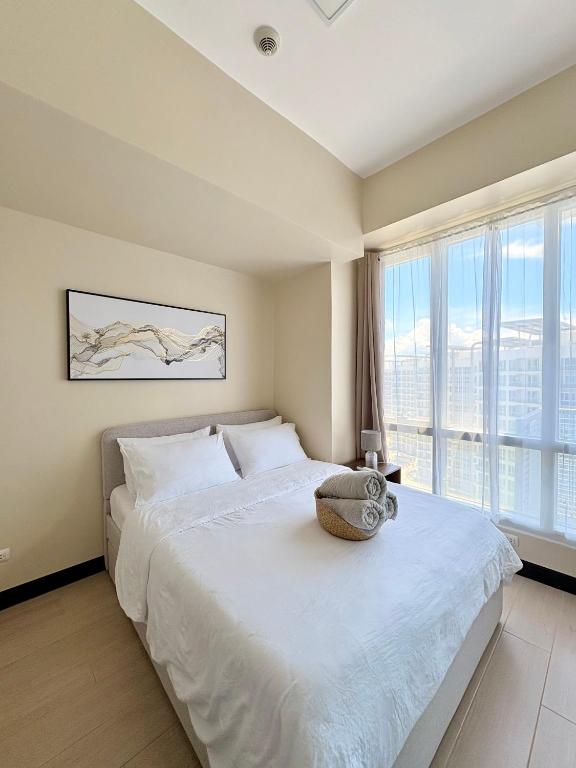 Modern Condo in Mactan Newtown - OPR Tower B - Chambres d'hôtes Lapu-Lapu City