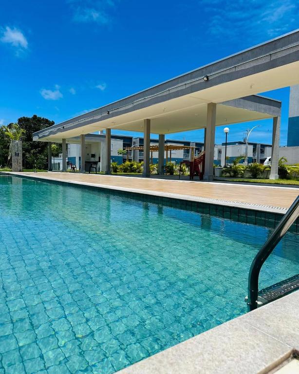 Aconchego da Alê em Porto, Ar condicionado e Piscina, Apartamento inteiro, Cozinha completa, Wifi, 02 Quartos confortáveis, travesseiro nasa , Colchão confortável ideal para férias descanso lazer ou negócios - B&B Porto Seguro