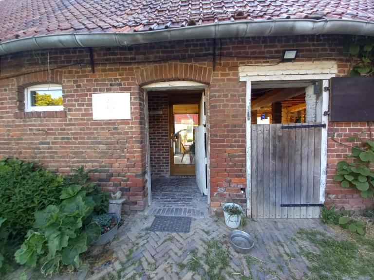Déconnectez-vous parmi les animaux dans une étable - Bed and Breakfast Oxelaere