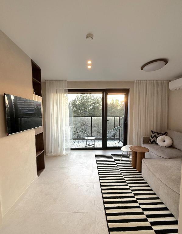 Vanagupe Sunset Apartment - Ferienwohnung Palanga