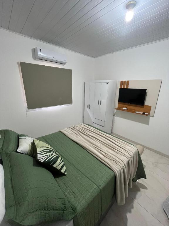 AP 5 C/Garagem>Ar>Wifi>Cozinha>Tv Disney+>Pet free - B&B Ji Paraná