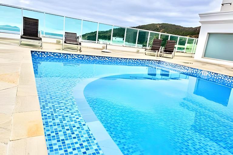 Hospedatom - Apartamento Luz do Sol - Conforto e Lazer em Arraial do Cabo - Bed and Breakfast Arraial do Cabo