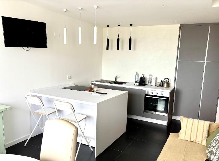 FabFour - Piazza Fontana - B&B Lignano Sabbiadoro