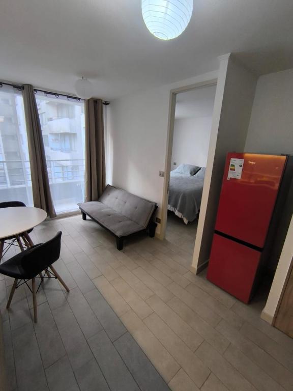 Departamento 1 Dormitorio Central con Estacionamiento Piso 9 - Chambres d'hôtes Santiago