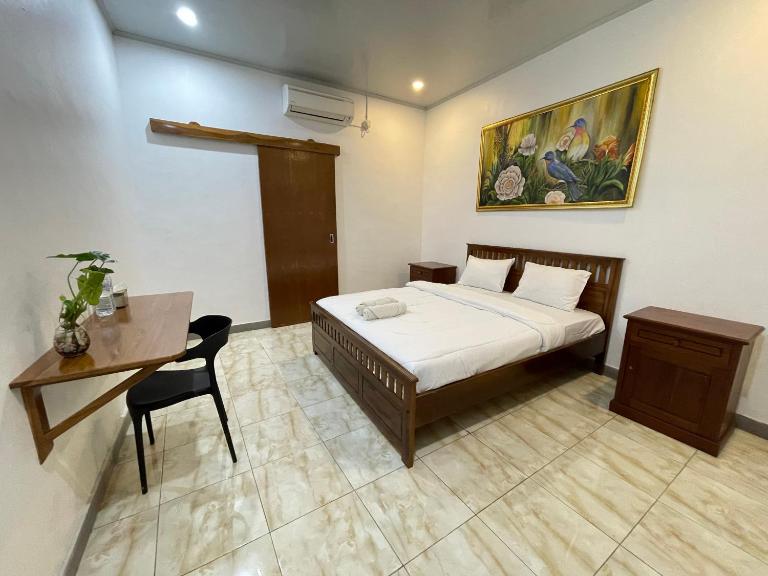 Wella Mas Homestay - Bed and Breakfast Labuan Bajo