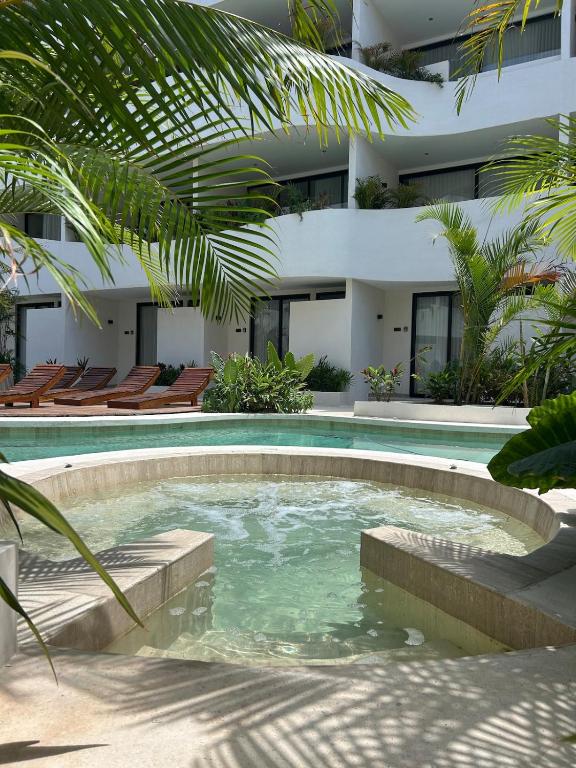 Your Ideal Retreat GF Oasis with Pool Access for 3 - Chambres d'hôtes Tulum