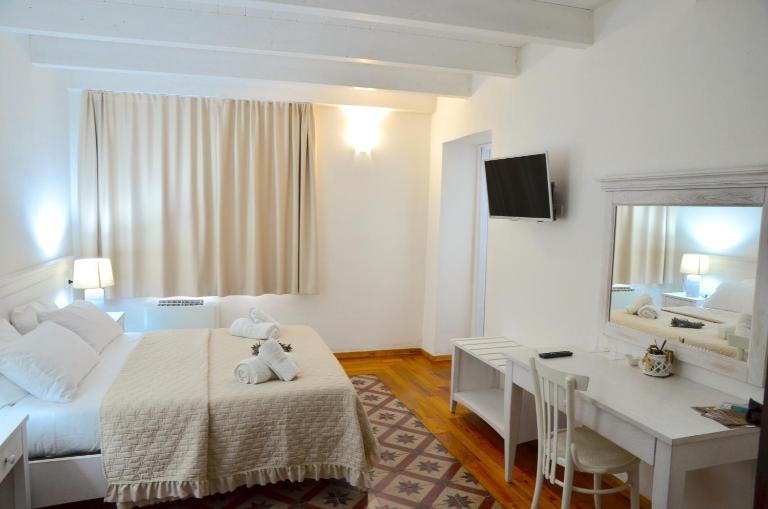 L'Araucaria Guest House - Charming Rooms near Is Arutas and the Sinis Peninsula - B&B Riola Sardo