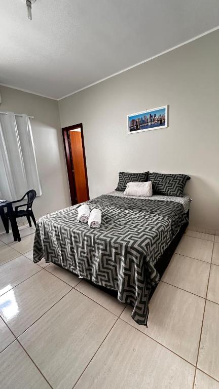 Suíte privativa no centro da capital em casa compartilhada - B&B Palmas