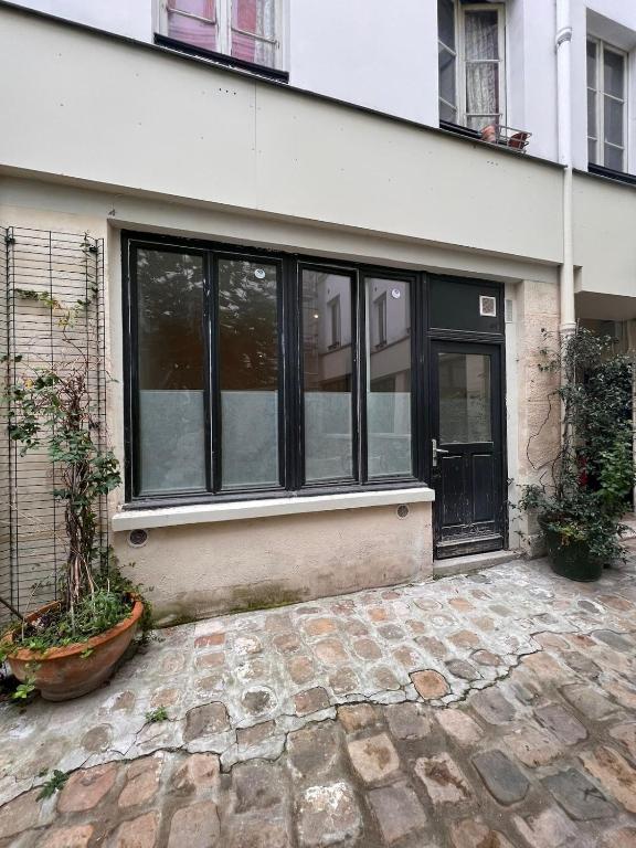 Studio lumineux sur cour à Bastille - B&B Parigi