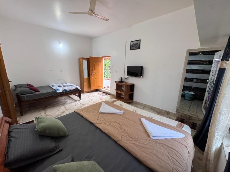 Sukhavana home stay suite - B&B Madikeri