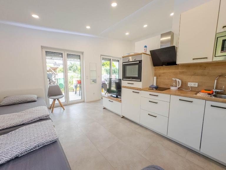 Neubau Wohnung mit Terrasse im EG - B&B Egelsbach