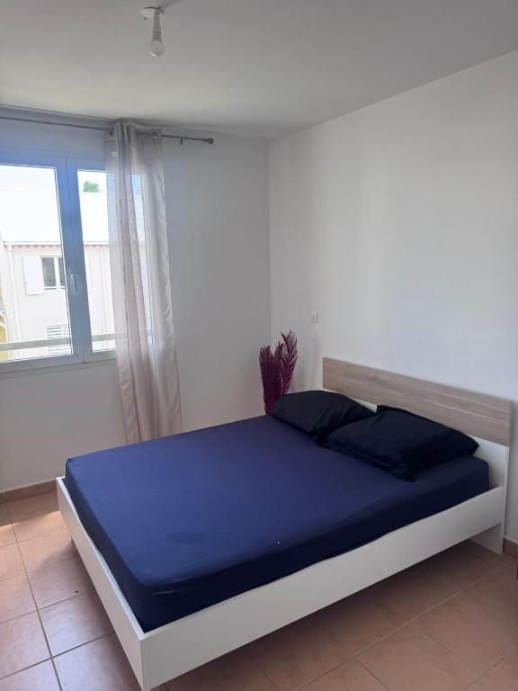 Maison mitoyenne cosy avec piscine - B&B Baie-Mahault