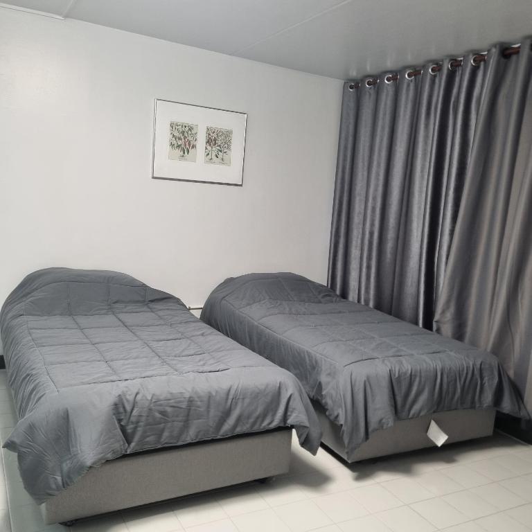 Popular Muang Thong Thani Condo, Building T9, Floor 8, Room 13 - B&B Pak Kret