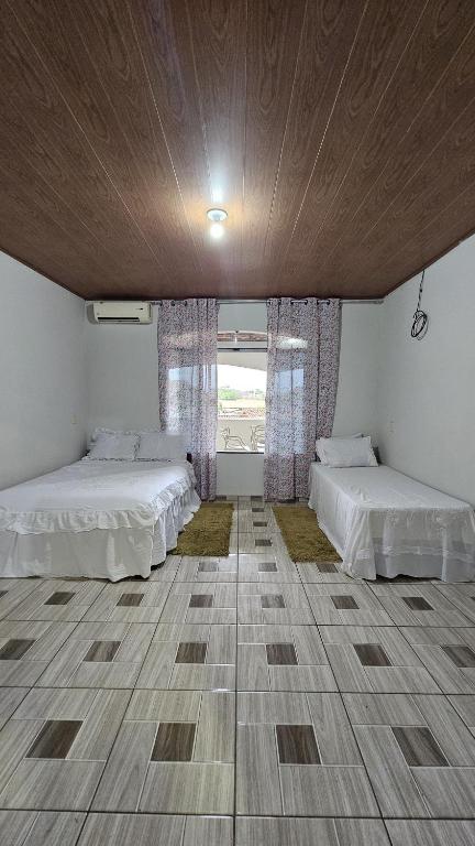 Casa Amarela no Centro - Chambres d'hôtes Barreirinhas