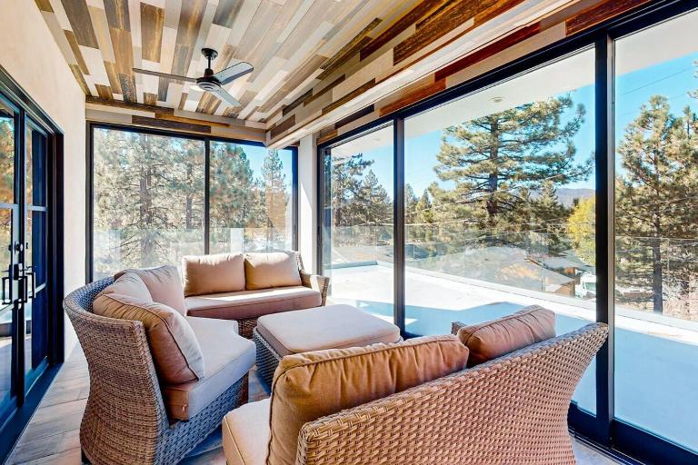 Hillside Hideaway ~ Dog-friendly home with wraparound deck, grill, game room, & bar - walk to dining - B&B Big Bear Lake