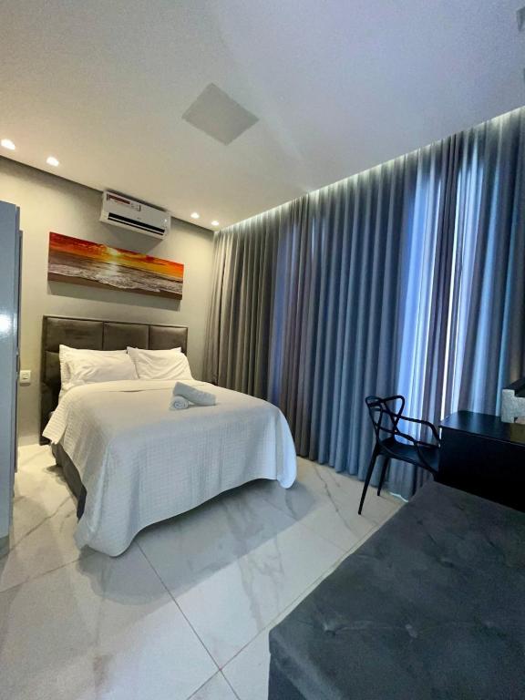 Casa Flat, Suíte, Ar-Cond, Área Gourmet e Garagem - Chambres d'hôtes Montes Claros