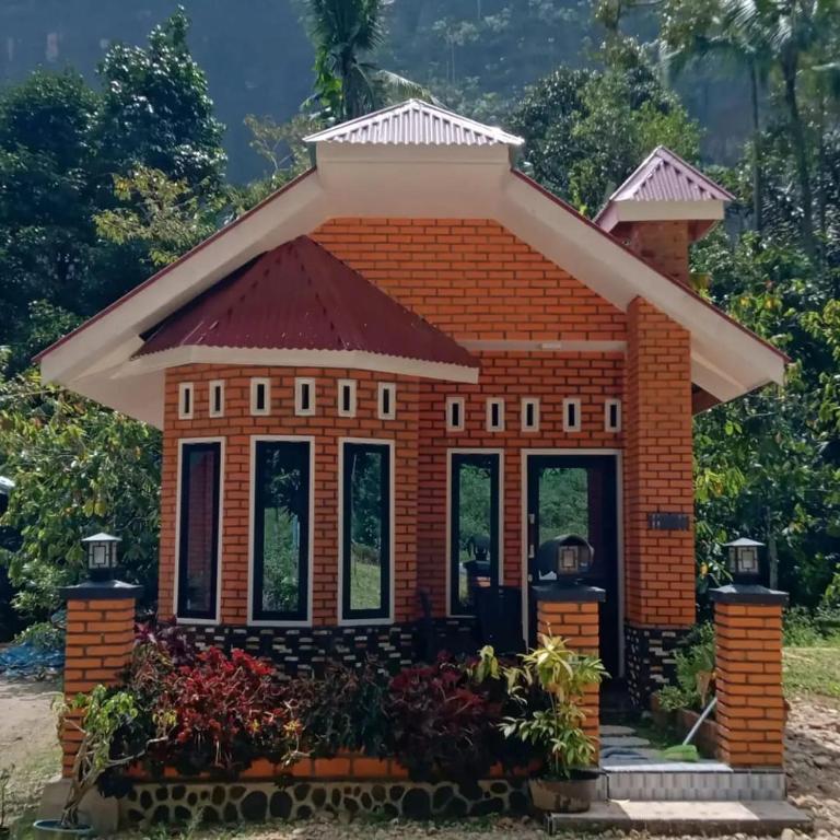 Kenzona Homestay - Chambres d'hôtes Andalas Dua