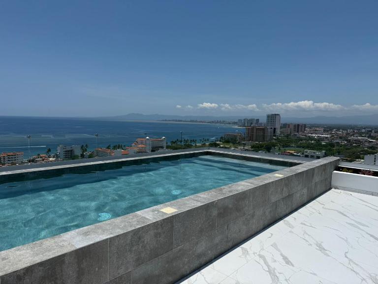 Modern 2BR Ocean view - Walk to Beach and Downtown - B&B Puerto Vallarta