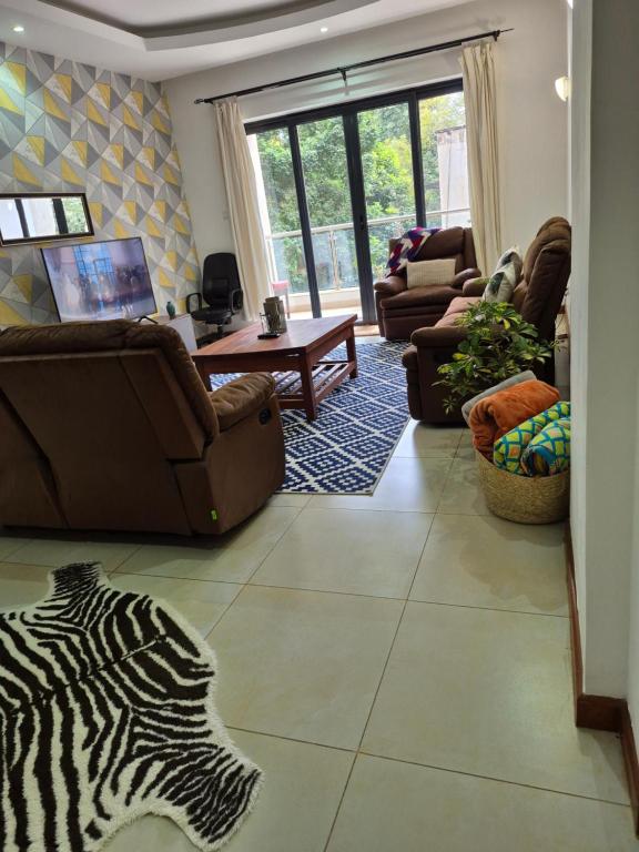 Aramis Apartments Deluxe Retreat at the Centre of Westlands with Pool & Functionional Gym - B&B Nairobi