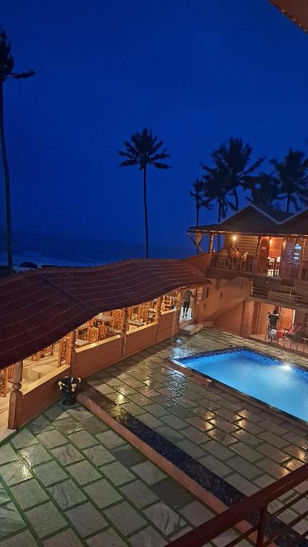 Bella Casa Beach Resort - Chambres d'hôtes Varkkallai
