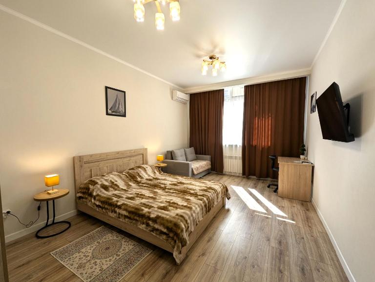 Cozy Nadezhda Apartments near Mega Park - B&B Almaty