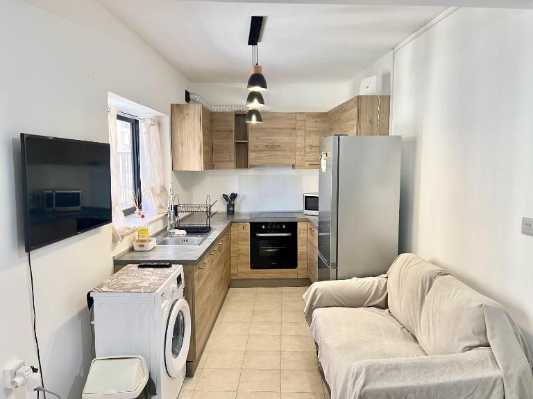 Be Happy Three-Bedroom Apartment - Chambres d'hôtes San Pawl il-Bahar