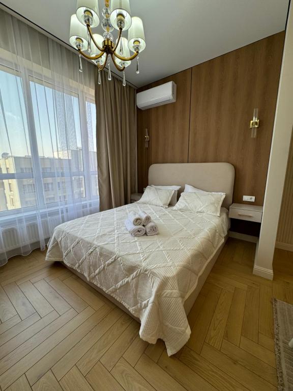 кв 237 ЖК Meridian 1 комнатная квартира в центре города - Chambres d'hôtes Almaty