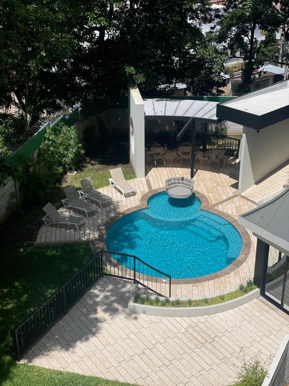 Moderno apart en Col Escalón,vista,piscina,gimnasio - Chambres d'hôtes San Salvador
